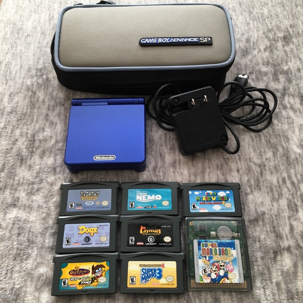 Game Boy Advance SP Bundle includes (8) Games, Case and Nintendo Wall Charger